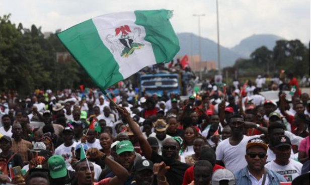 Nigerian crowd with flag